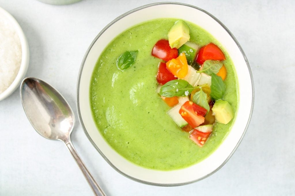 Vegan cold cucumber soup with avocado and basil