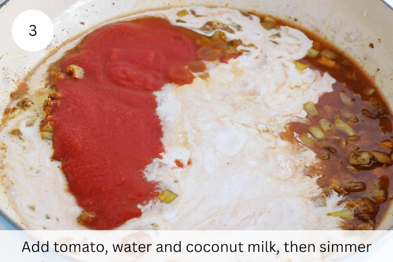 In process picture: add tomato, water and coconut milk.