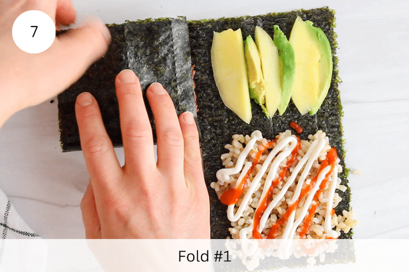 In process picture: fold the nori from bottom left to top left.
