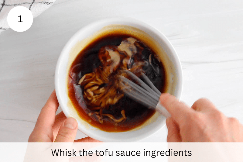 In process picture: whisk the tofu sauce ingredients.