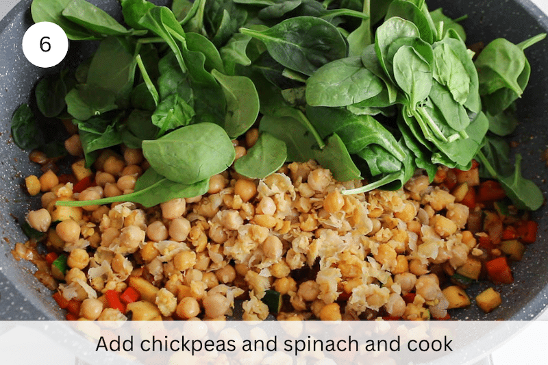 In process picture: add chickpeas and spinach.