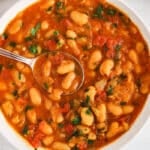 View on a vegetarian loubia made with white beans and fresh herbs.