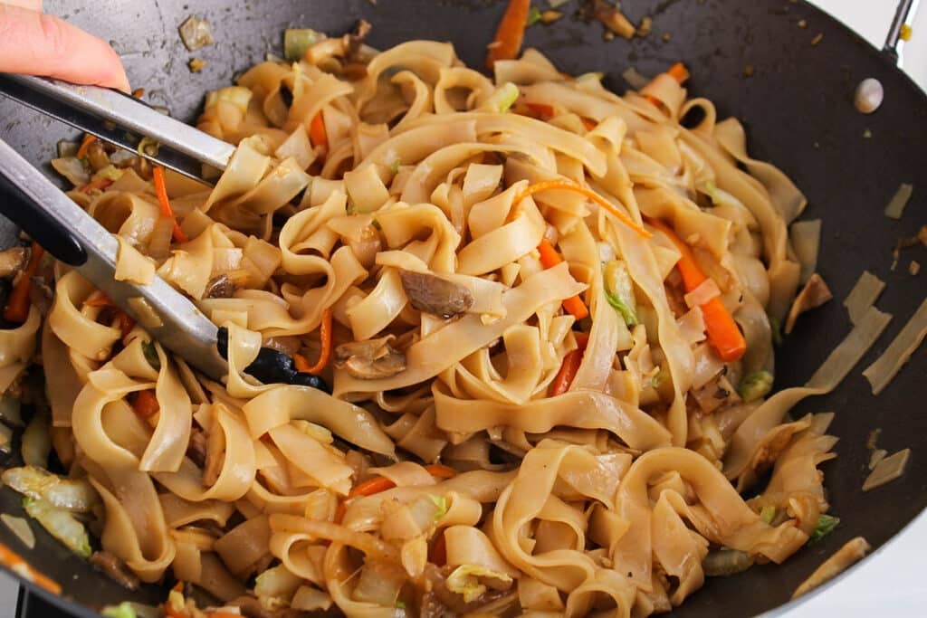 View on a large wok with Vietnamese vegetable stir-fried noodles.
