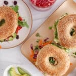View on a few hummus bagels sandwich packed with different filling.