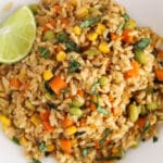 View on Thai fried rice made with vegetable medley and green curry paste.