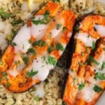 Roasted harissa aubergine with vegan yogurt sauce and fresh parsley.