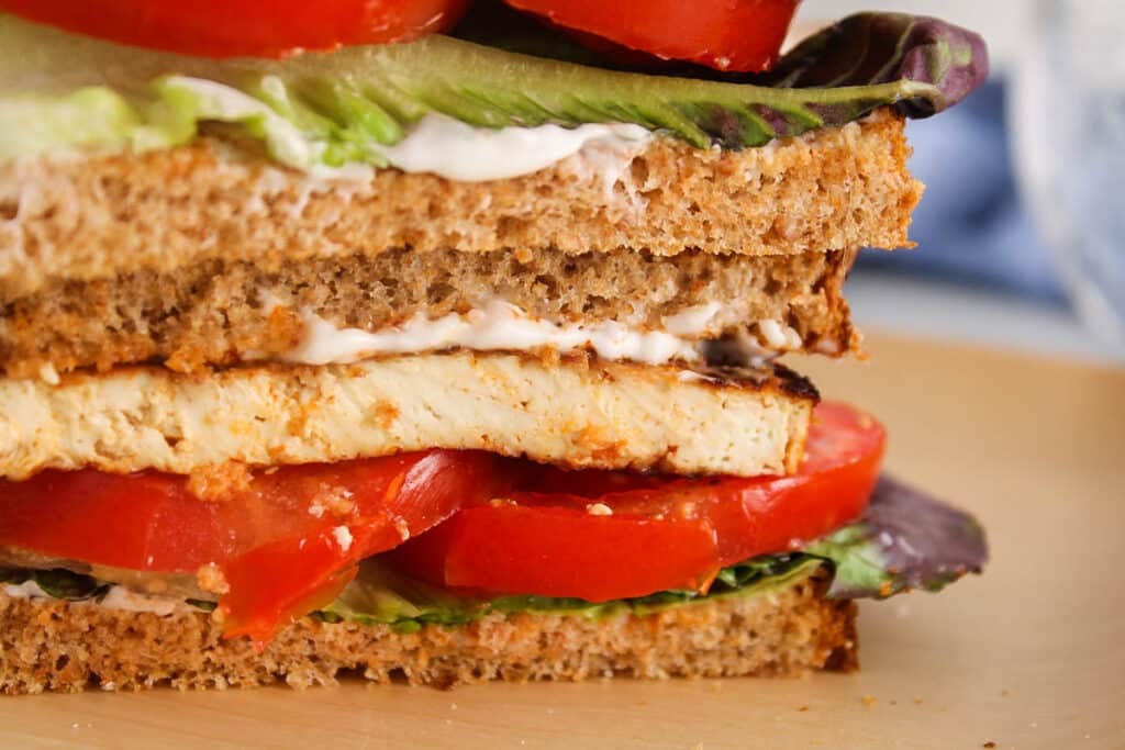 Vegan tofu bacon in a BLT sandwich.