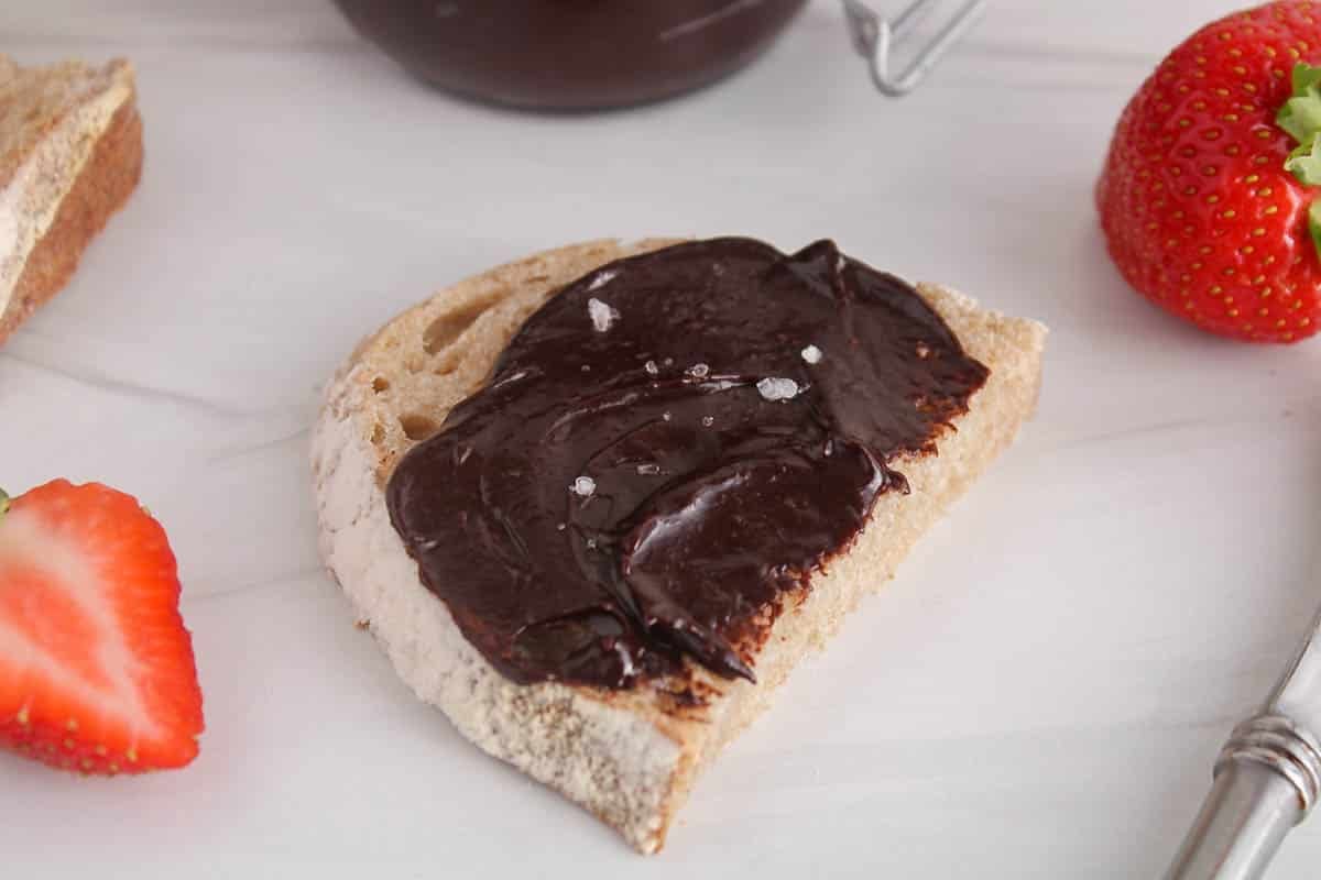 Chocolate tahini spread over toast.