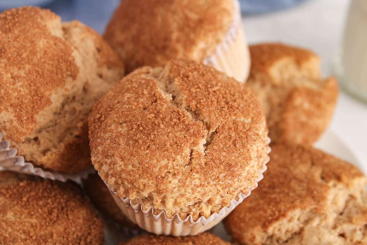 Top part of a vegan cinnamon muffins with a sugar cinnamon crust.