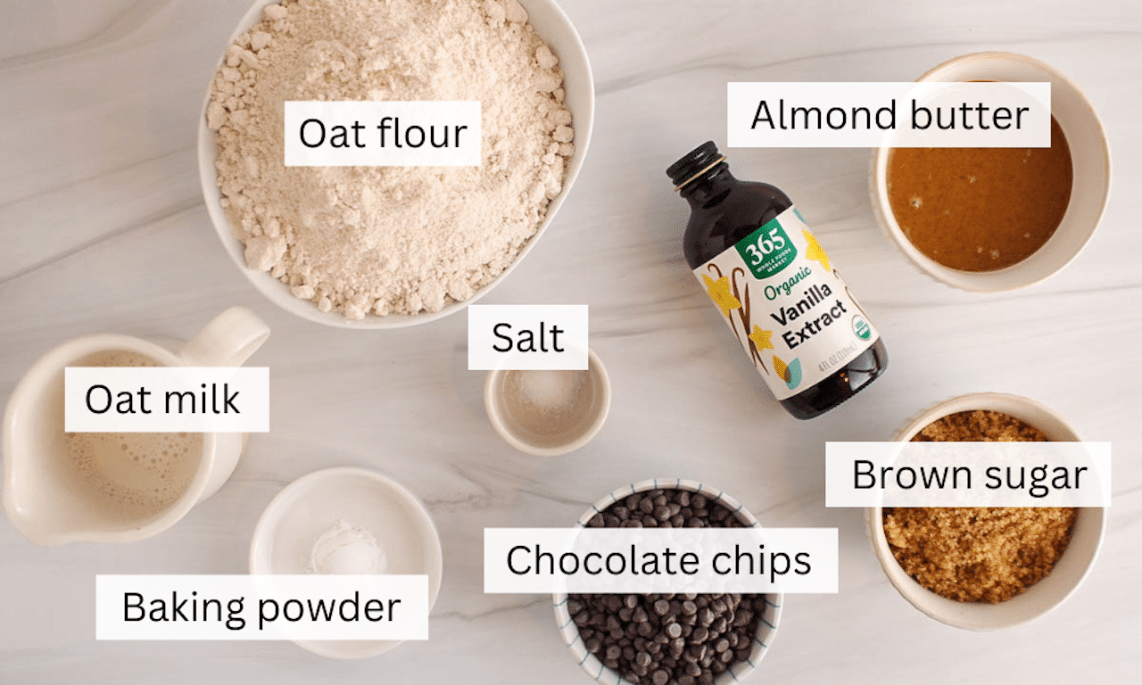 Ingredients to make vegan oat flour cookies placed on a table.