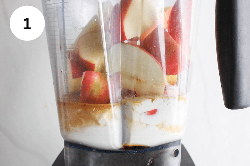 Yogurt, apples, maple syrup and spices in a blender.