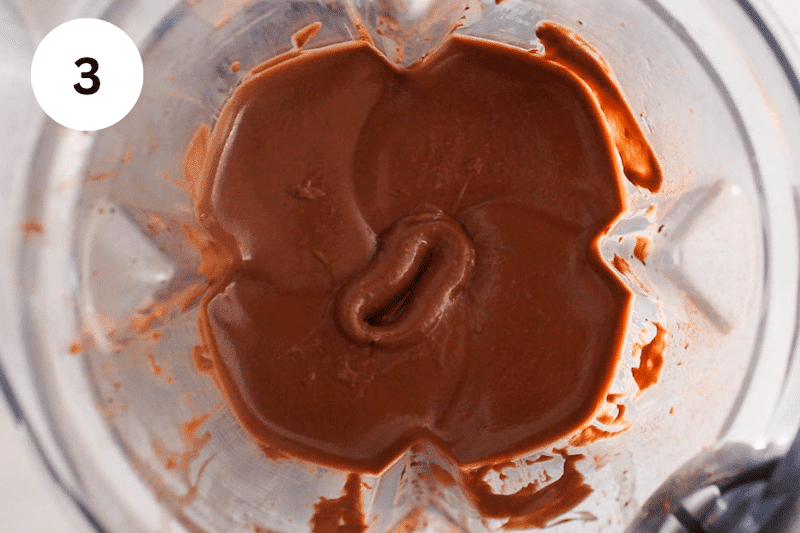 A dark chocolate mousse in a blender.