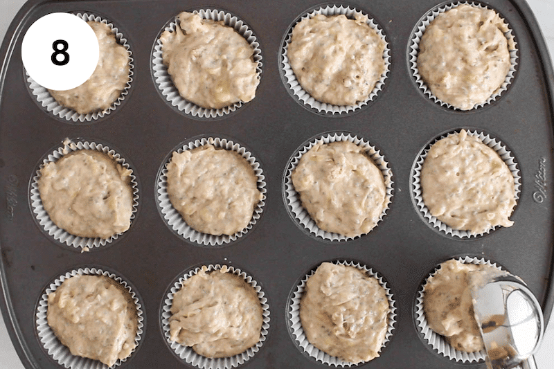 Dividing the batter in a muffin pan.
