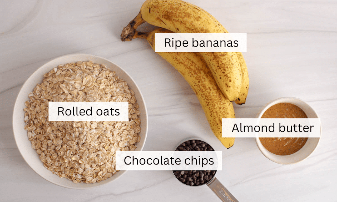 Showing are the ingredients needed to make 4-ingredient banana oat cookies placed on a white table.