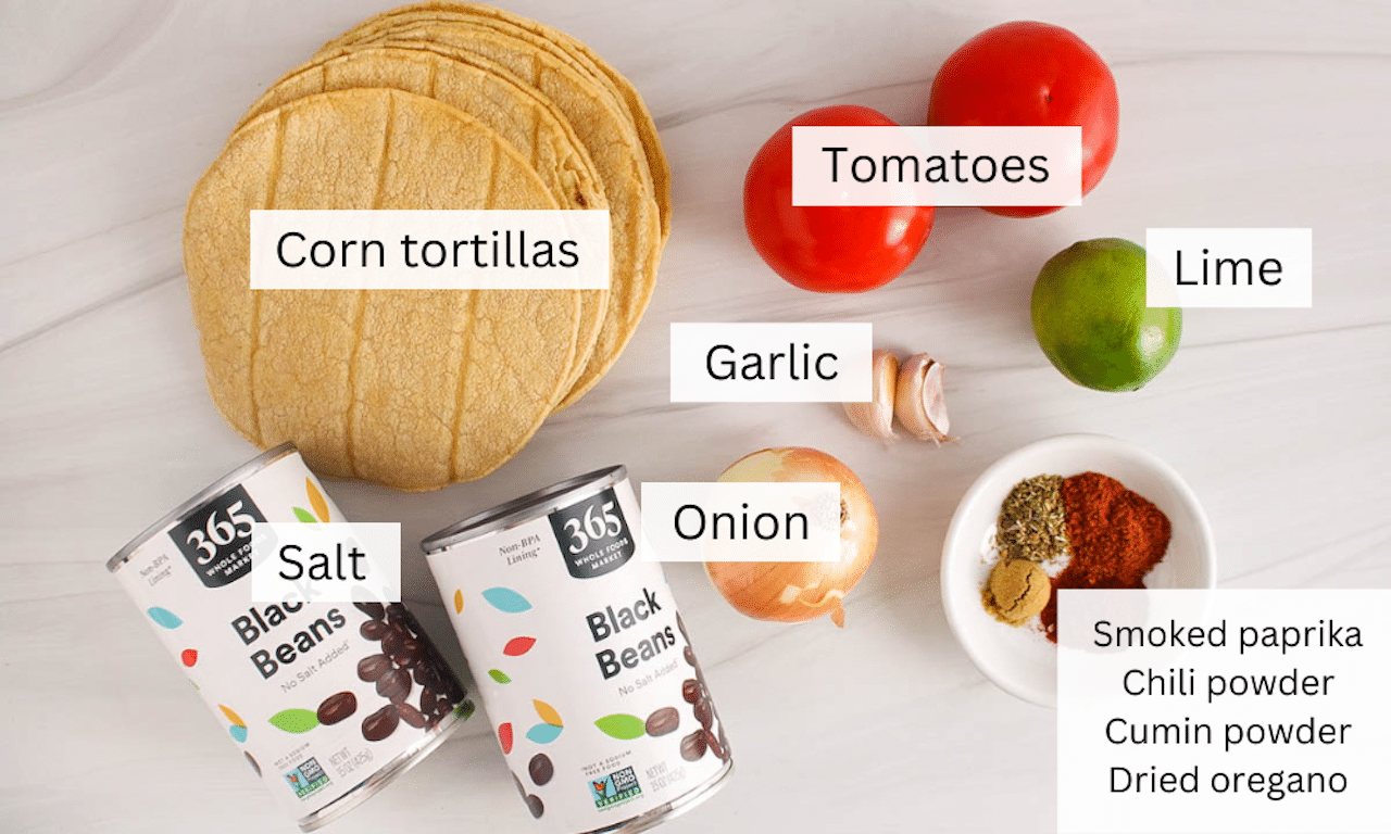 Ingredients needed to make crispy baked black bean tacos on a white table.