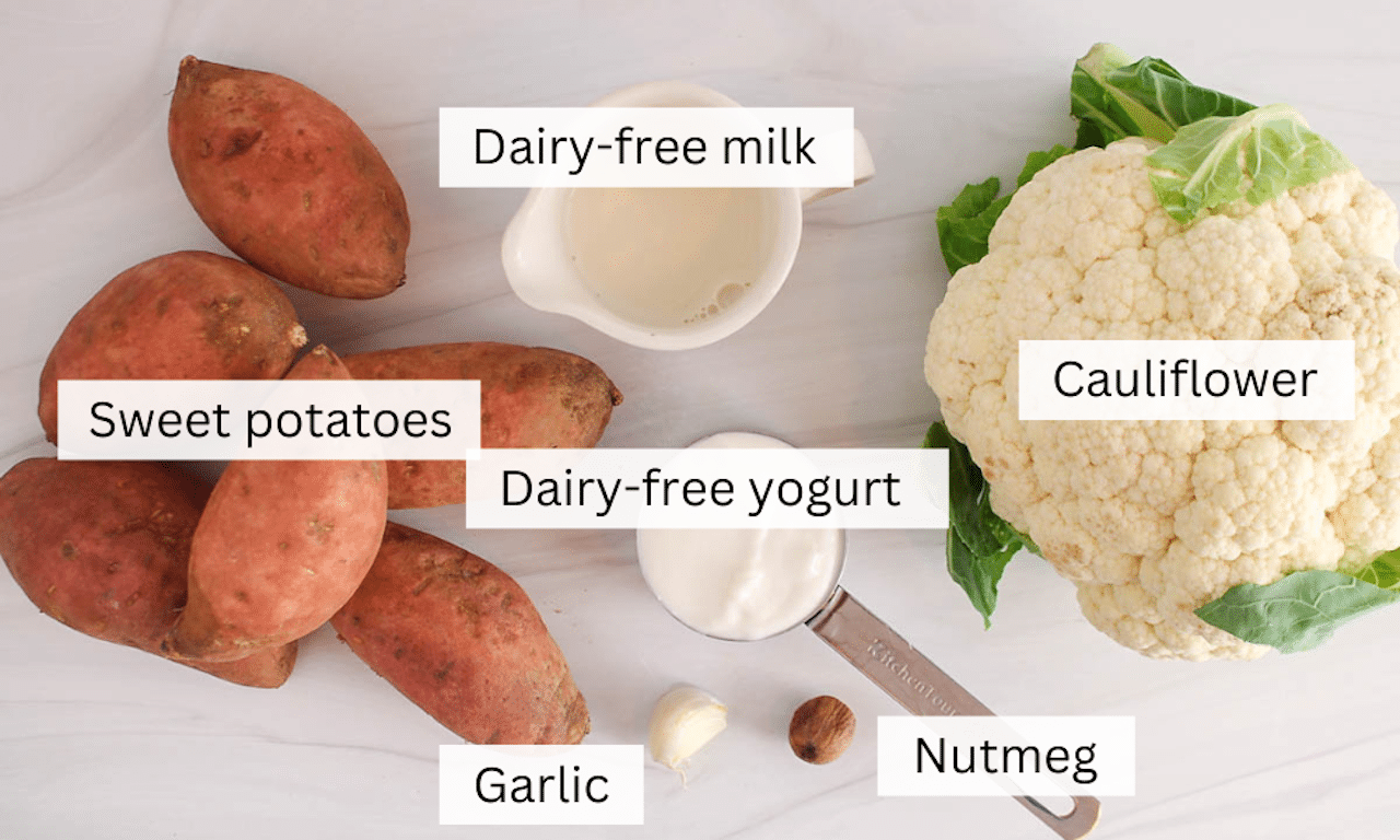 Ingredients to make mashed sweet potato and cauliflower placed on a table.