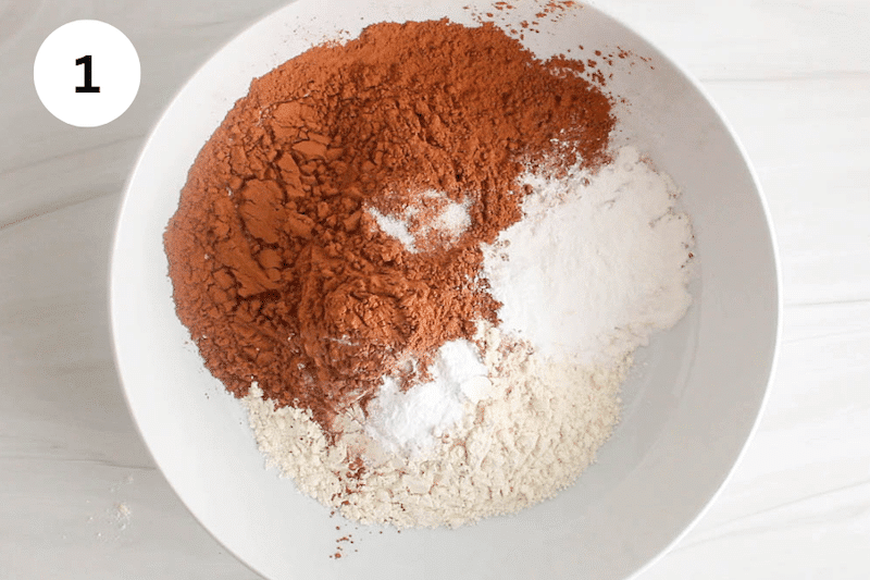 Flour and cacao powder in a mixing bowl.