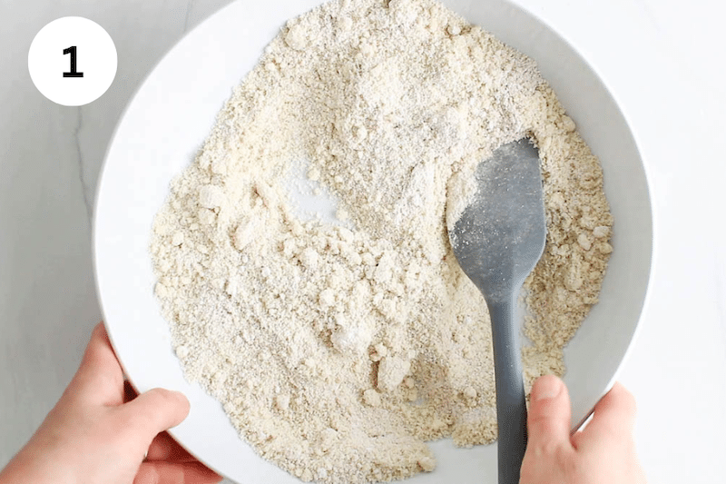A mix of flour in a white bowl.