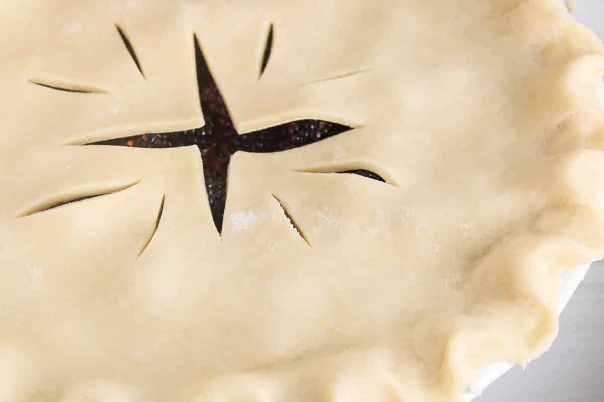 Top part of a fruit pie made with a coconut oil 3-ingredient pie crust.