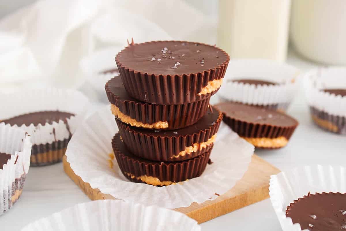 A pile of 4-ingredient peanut butter cups garnished with coarse salt.
