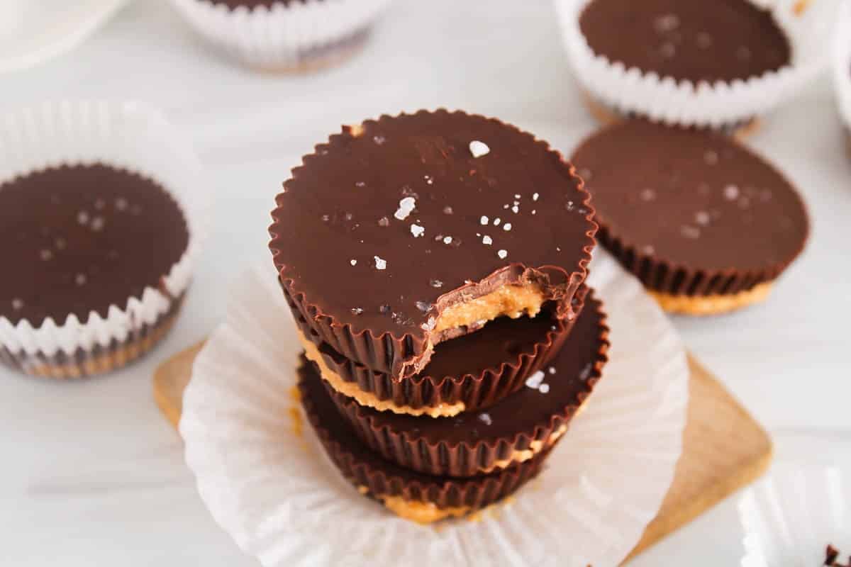 A 4-ingredient peanut butter cup with a bite taken off.