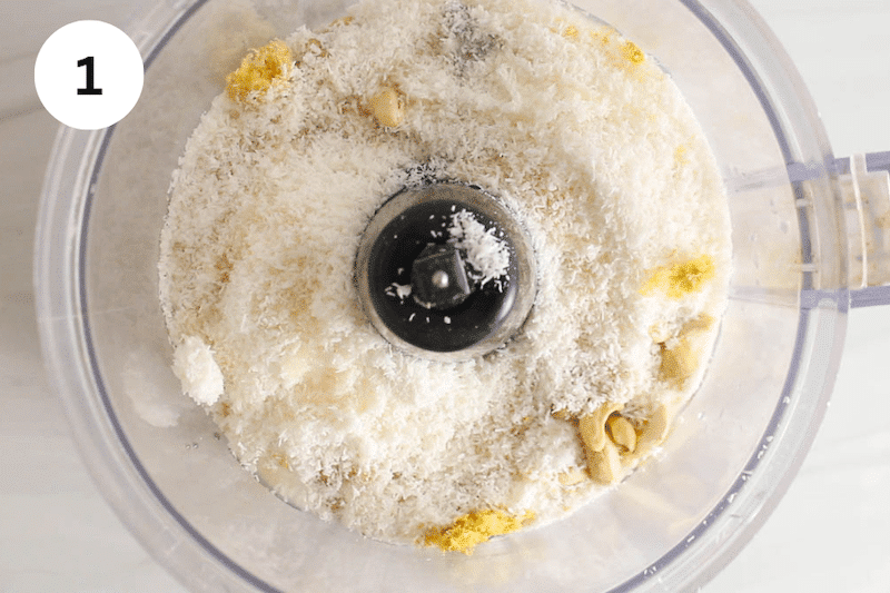 Cashews, coconut and lemon zest into a food processor.