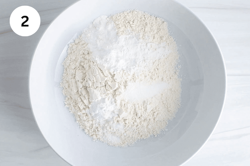Flour and baking powder in a large bowl.