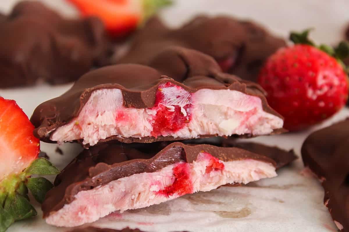 Showing the inside of chocolate covered strawberry yogurt clusters.