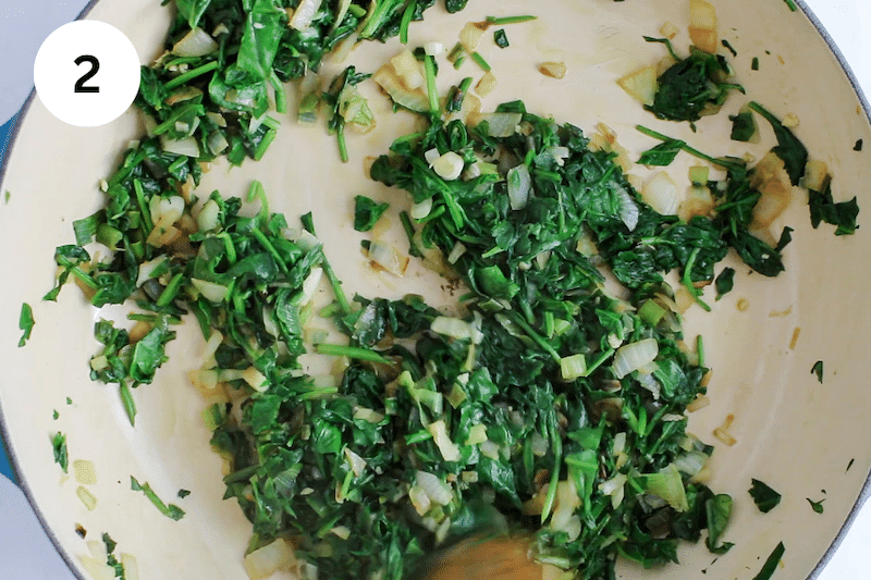 Large pan with spinach.