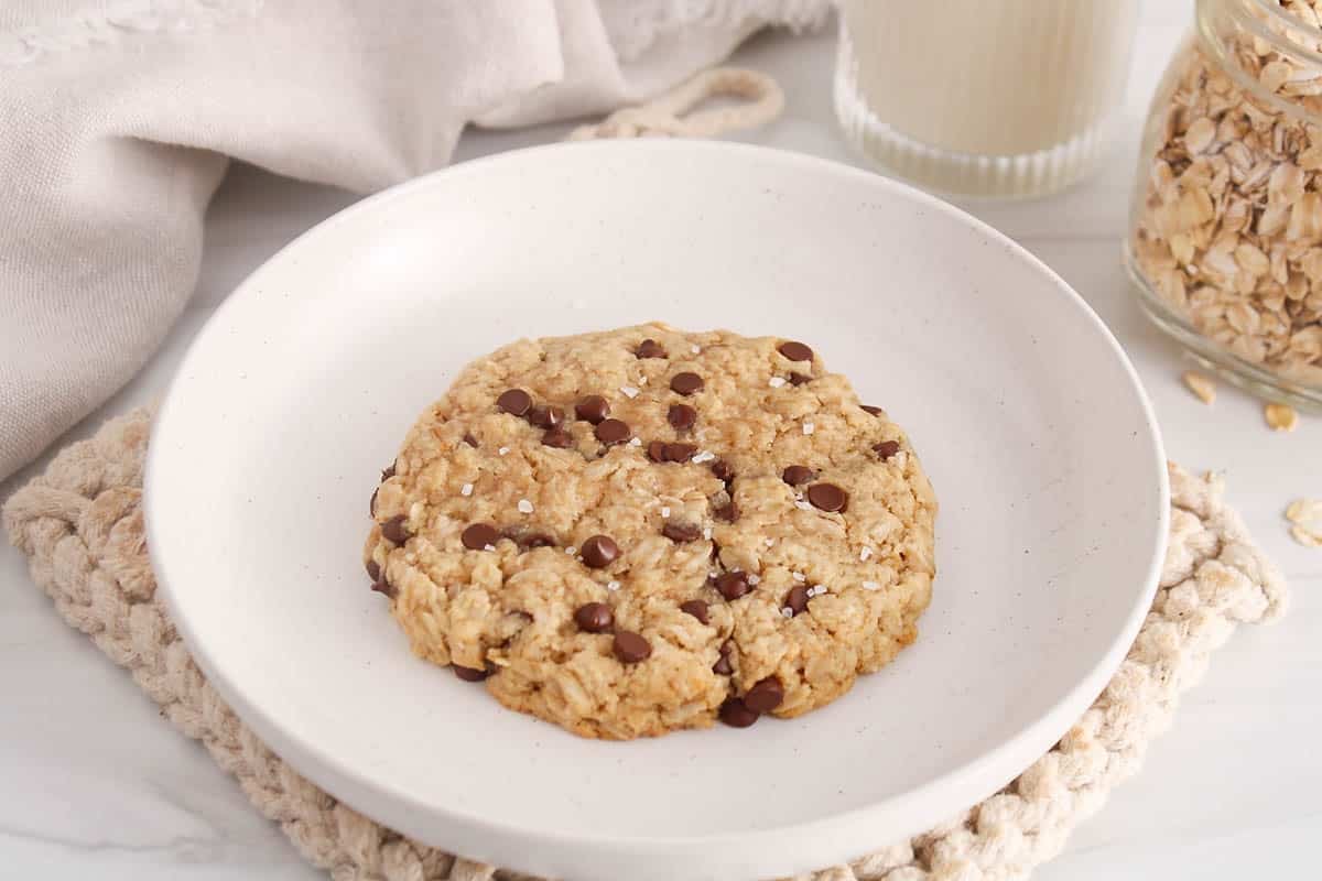 Single serve oatmeal chocolate chip cookie on a plate.