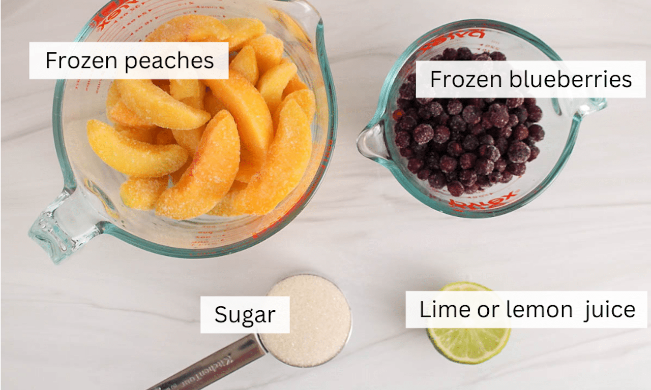 Showing are the ingredients needed to make a blueberry peach sorbet.