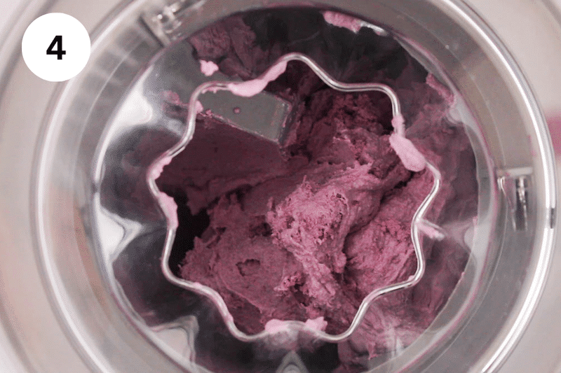 A purple ice cream in a churning machine.