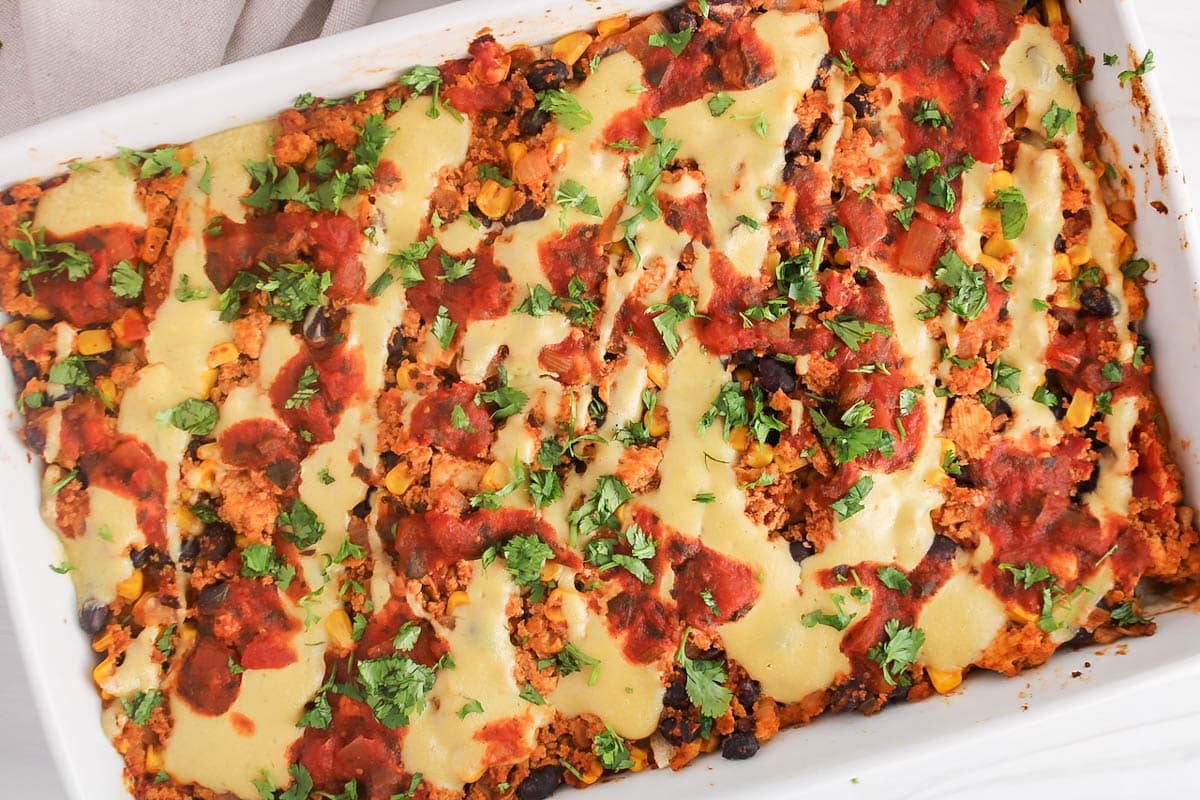 Vegan taco casserole garnished with cilantro.