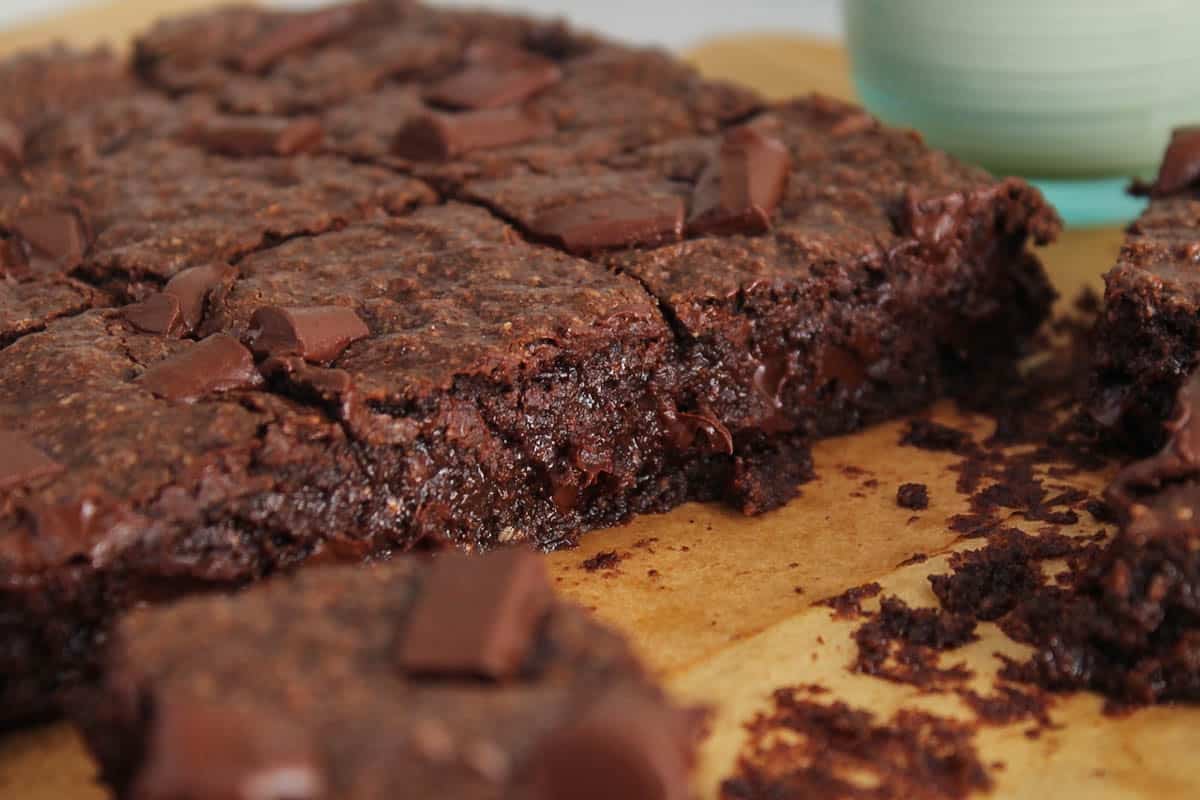 Gooey buckwheat brownies with melted chocolate oozing out.