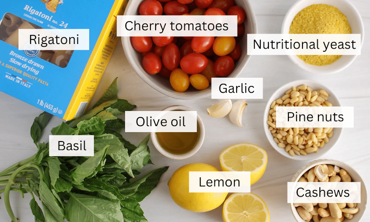 Showing are the ingredients needed to make Pesto Rigatoni with Roasted Tomatoes.
