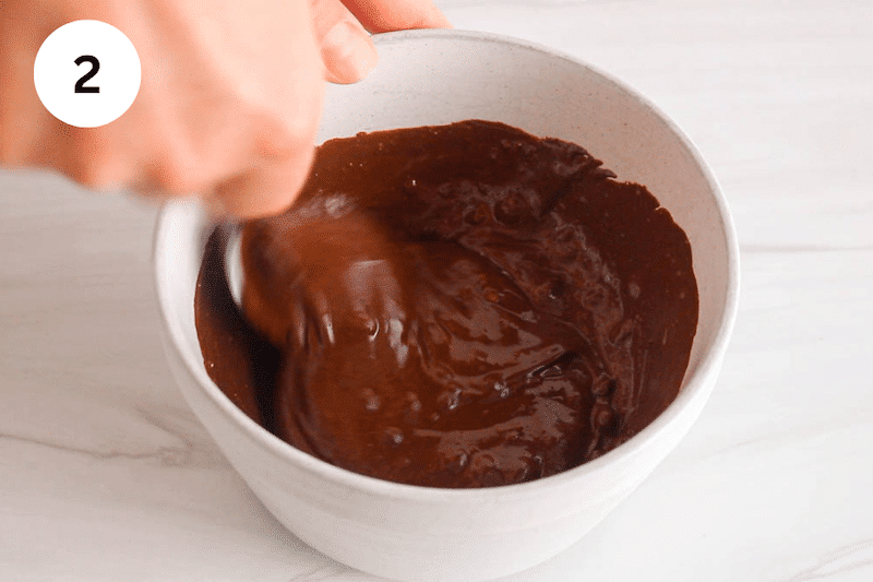 A bowl with melted chocolate peanut butter.