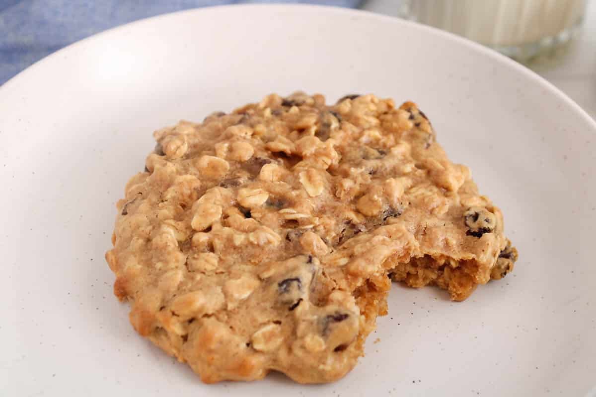 Healthy Single Serve Cookie with a bite taken off placed on a white plate.