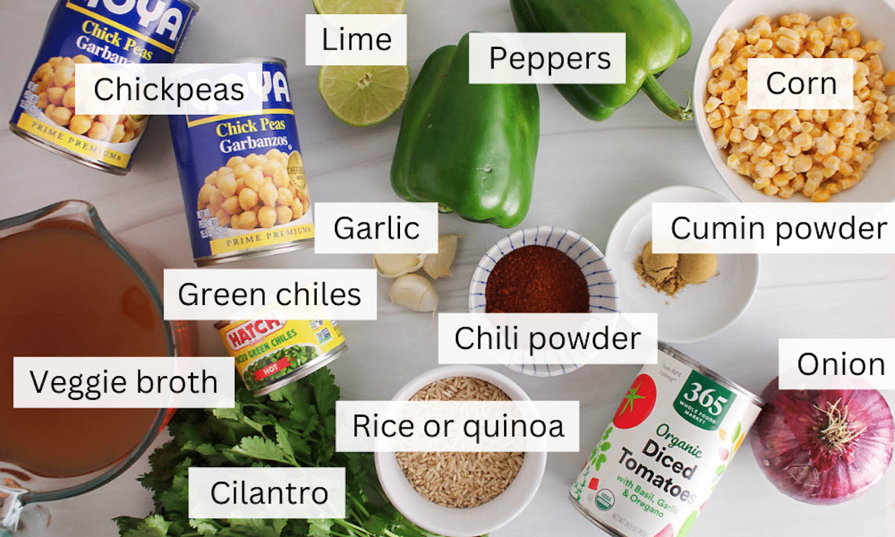 Ingredients needed to make a chickpea taco soup on a white table.